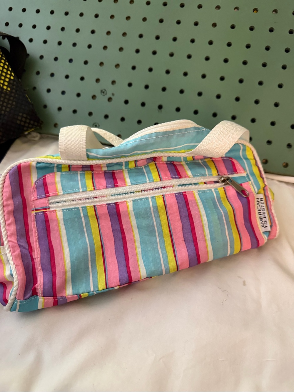 American Tourister Multicolor Striped Small Women's hand bag for a grab and go!